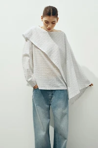 Blouse en crépon avec cape