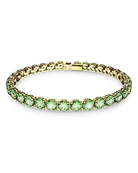 Matrix Blue Crystal Large Tennis Bracelet in Gold Tone