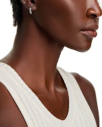 Diamond Baguette Huggie Hoop Earrings in 14K Gold
