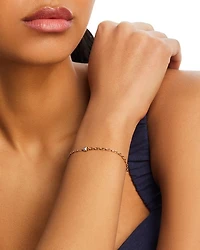 14K Yellow Gold Baguette Diamonds Diamond Baguette Oval Link Bracelet, 0.06 tcw