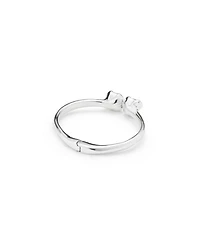 Sterling Silver-Plated Bangle Bracelet with Inner Spring and Two Blue Crystals