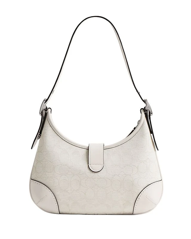 Shop COACH Swinger Bag in Signature Jacquard at Beverly Center in