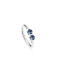 Sterling Silver-Plated Bangle Bracelet with Inner Spring and Two Blue Crystals