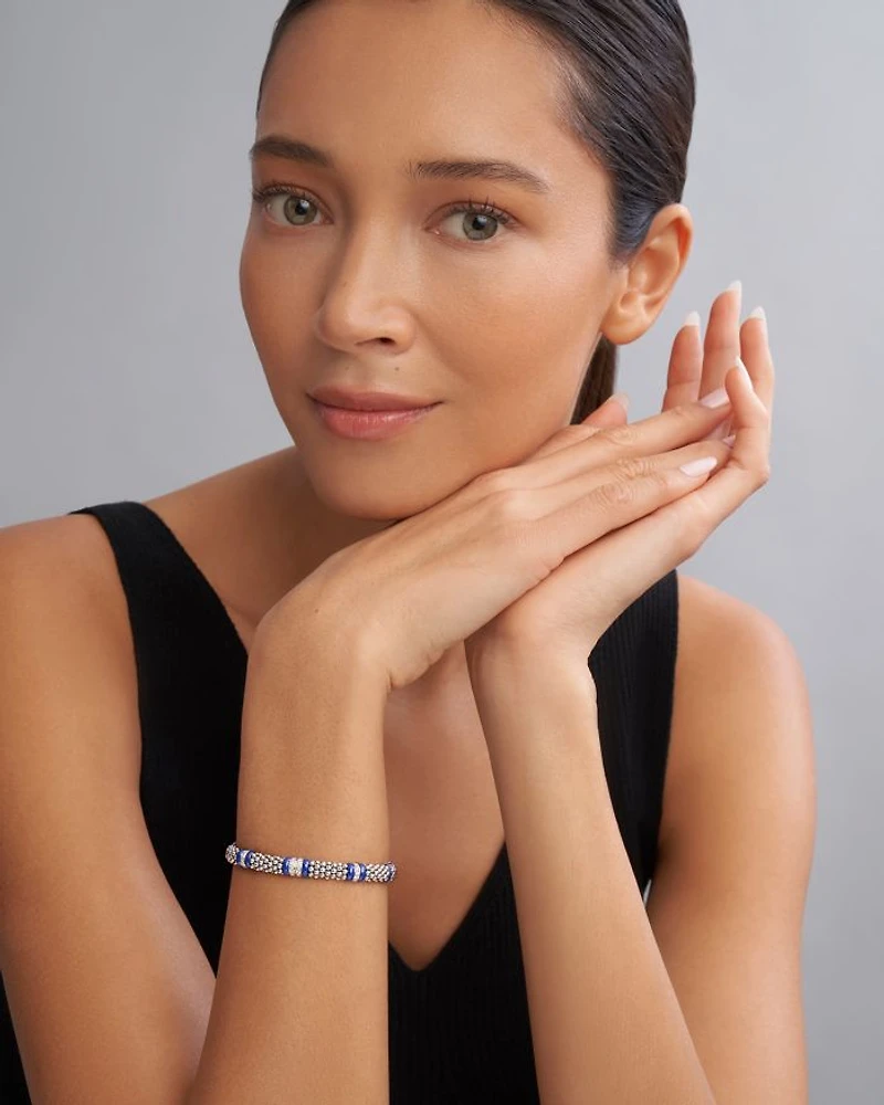 Four Station Diamond Blue Caviar Bracelet Sterling Silver
