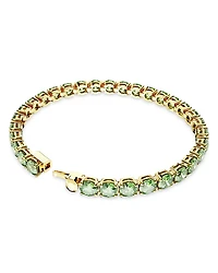 Matrix Blue Crystal Large Tennis Bracelet in Gold Tone