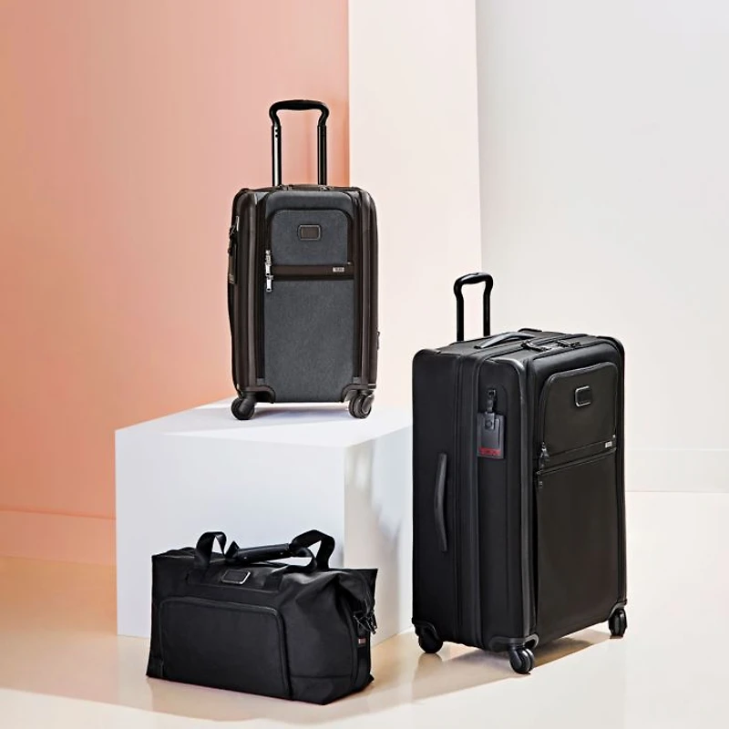 Alpha 3 International Expandable 4-Wheel Carry-On