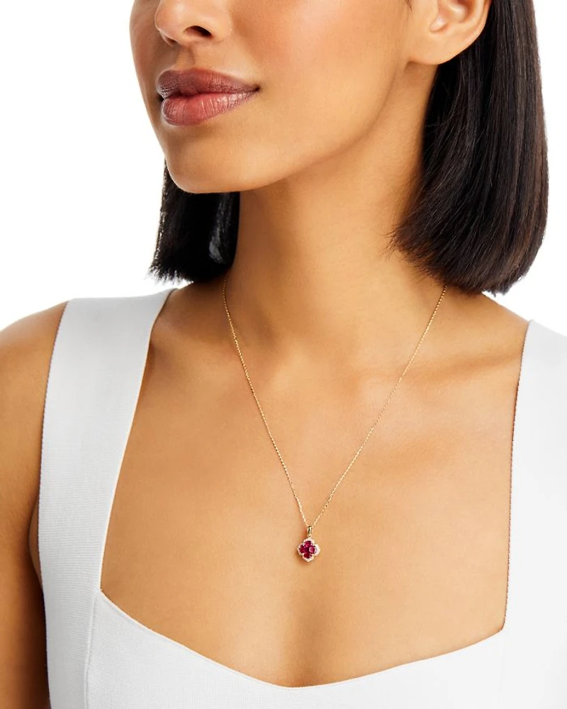 Ruby & Diamond Flower Halo Pendant in 14K Yellow Gold