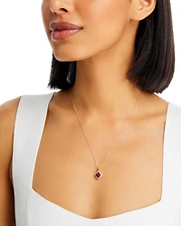 Ruby & Diamond Flower Halo Pendant in 14K Yellow Gold