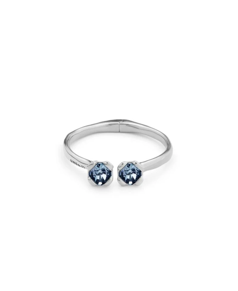 Sterling Silver-Plated Bangle Bracelet with Inner Spring and Two Blue Crystals