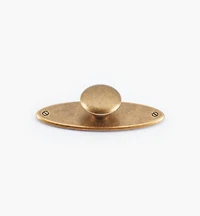 Bouton sur platine ovale