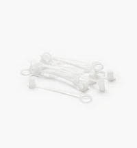 Capuchons avec attache pour bouteilles compressibles