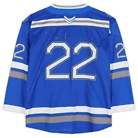Maillot bleu n° 22 de l'équipe des Falcons de l'Air Force avec écusson du 20e anniversaire du programme de hockey