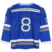 Maillot bleu n°8 de l'équipe des Falcons de l'Air Force avec écusson du 20e anniversaire du programme de hockey
