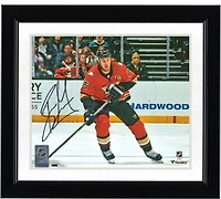 Photographie autographiée de Ryan Getzlaf des Ducks d'Anaheim en maillot orange de 8" x 10" en train de patiner avec une rondelle