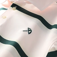 Polo à rayures piqué rose Puma Arnold Palmer Invitational pour homme