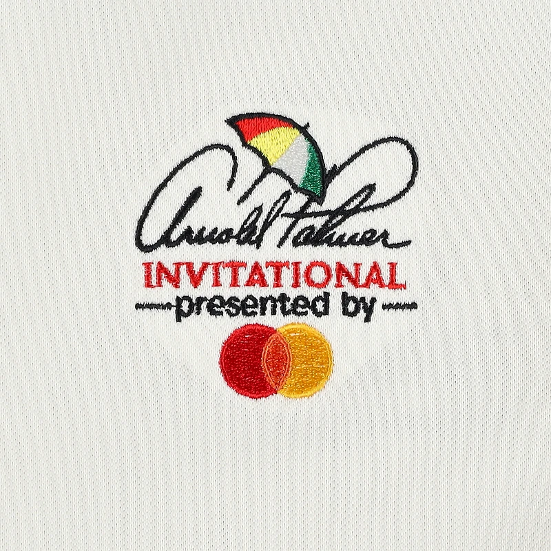 Polo piqué Puma crème Arnold Palmer Invitational pour femme