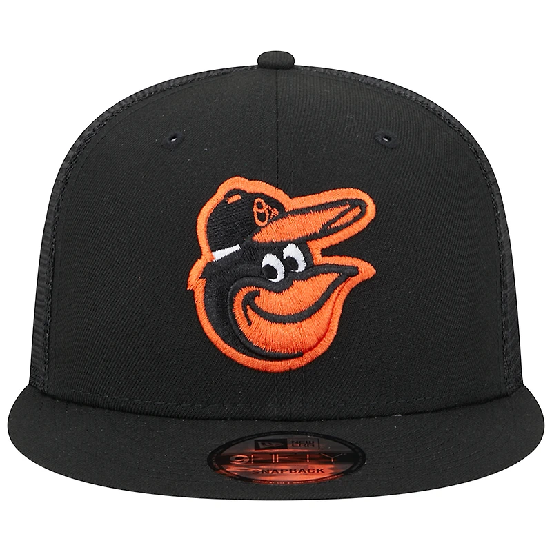 Men's New Era Black Baltimore Orioles Team Color Trucker 9FIFTY Snapback Hat