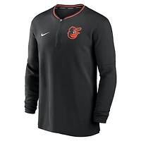 Haut Nike Performance demi-zippé noir Baltimore Orioles Authentic Collection pour homme