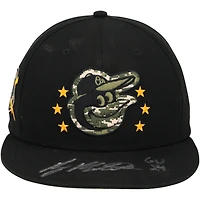 Casquette New Era noire et verte autographiée par Ryan Mountcastle, portée lors d'un match des Orioles de Baltimore (saison 2024 de la MLB), avec inscription « GU 24 ».
