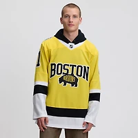 Maillot premium Fanatics Jeremy Swayman Gold des Bruins de Boston, série stades la LNH 2026