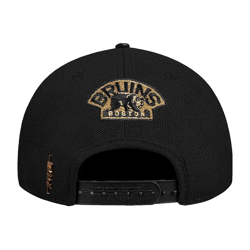 Casquette ajustable Pro Standard noire Boston Bruins avec logo métallique à pincement sur le devant pour homme