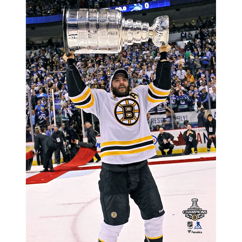 Patrice Bergeron Boston Bruins Unsigned 2011 Stanley Cup Champions Raising Photograph