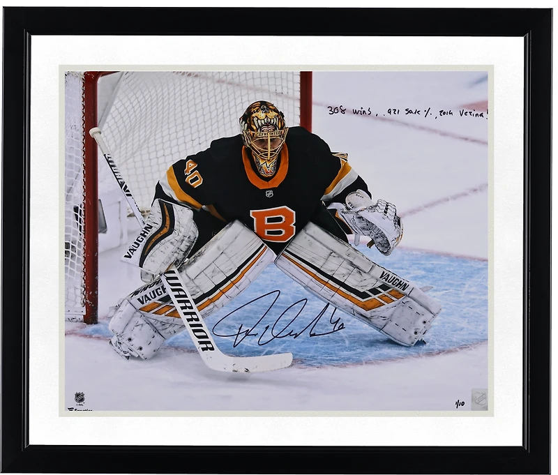 Tuukka Rask Boston Bruins Autographed 16" x 20" Black Alternate Jersey In Net Photograph with Multiple Inscriptions