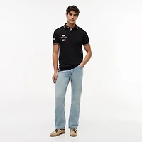 Polo unisexe Tommy Hilfiger x Cadillac F1 Team noir réplique