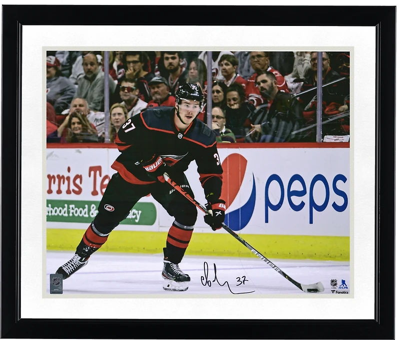Andrei Svechnikov Carolina Hurricanes Autographed 16" x 20" Black Jersey Skating Photograph