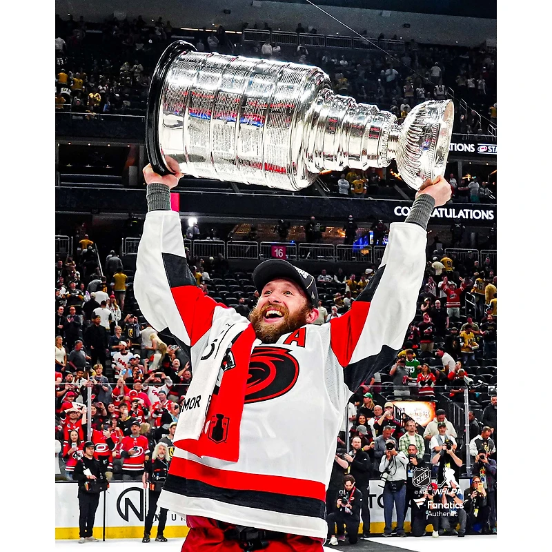 Jaccob Slavin Carolina Hurricanes Unsigned 2026 Stanley Cup Champions Raising Photograph