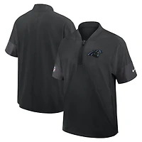 Veste d'entraîneur Nike Carolina Panthers Sideline noire pour homme, manches courtes, fermeture éclair au quart, technologie Dri-FIT