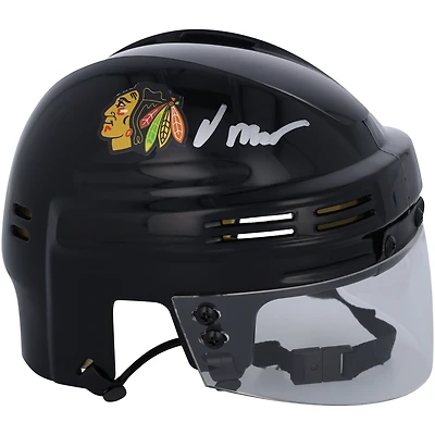 Casque mini noir autographié par Oliver Moore des Chicago Blackhawks