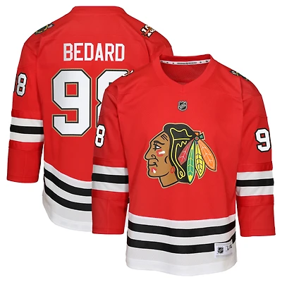 Maillot réplique du centenaire commémoratif de Connor Bedard, joueur des Blackhawks Chicago, rouge, pour jeunes la marque Outerstuff