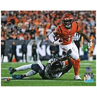 Ja'Marr Chase Cincinnati Bengals Autographed 8" x 10" Breaking Tackle Photograph