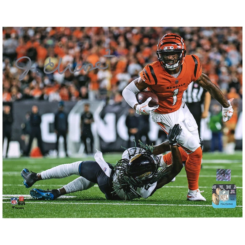 Ja'Marr Chase Cincinnati Bengals Autographed 8" x 10" Breaking Tackle Photograph