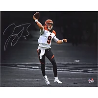 Joe Burrow Cincinnati Bengals Autographed 11" x 14" White Jersey Throwing Spotlight Photograph