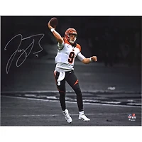 Joe Burrow Cincinnati Bengals Autographed 11" x 14" White Jersey Throwing Spotlight Photograph