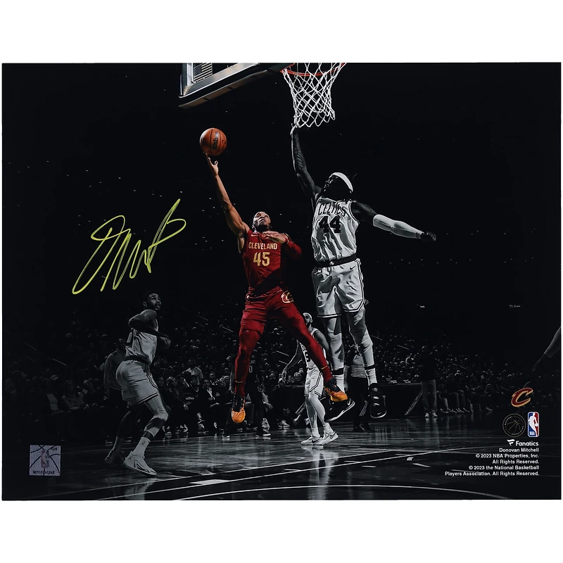 Donovan Mitchell Cleveland Cavaliers Autographed 11" x 14" Spotlight Layup Versus Boston Celtics Photograph
