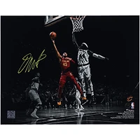 Donovan Mitchell Cleveland Cavaliers Autographed 11" x 14" Spotlight Layup Versus Boston Celtics Photograph