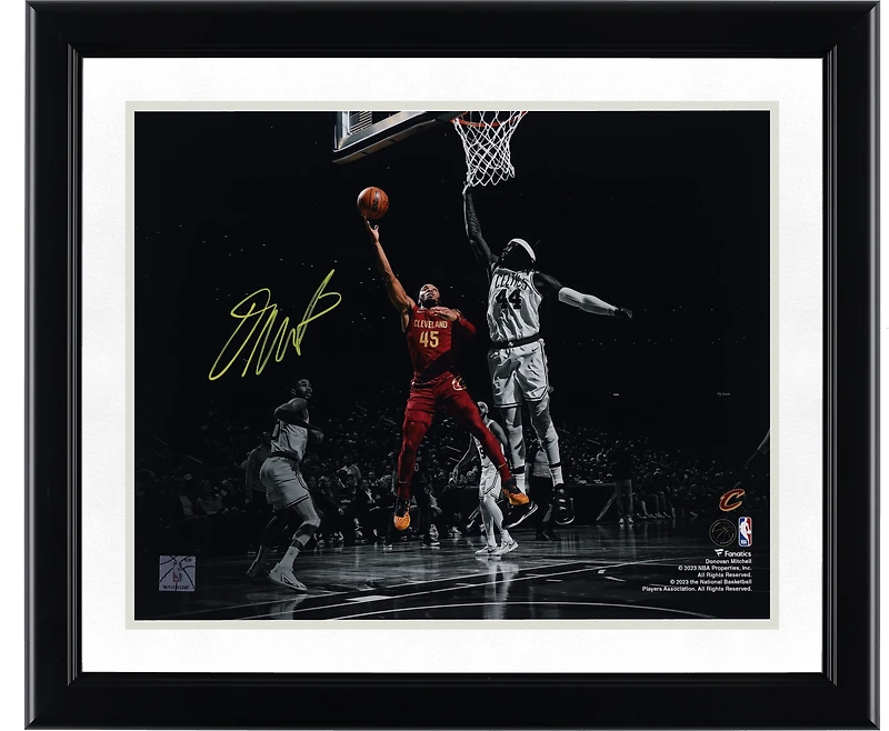 Donovan Mitchell Cleveland Cavaliers Autographed 11" x 14" Spotlight Layup Versus Boston Celtics Photograph