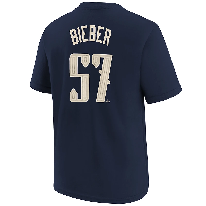 T-shirt Nike Shane Bieber pour jeunes Cleveland Guardians 2024 City Connect avec nom et numéro, bleu marine