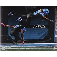 Amon-Ra St. Brown Detroit Lions Autographed 16" x 20" Touchdown Celebration Jumping Over Jahmyr Gibbs Photograph