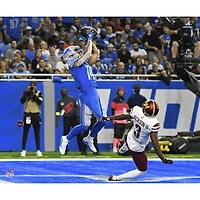 Amon-Ra St. Brown Detroit Lions Unsigned Makes Touchdown Catch Photograph