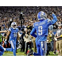 Jameson Williams, joueur non signé des Lions de Detroit, célèbre son premier touchdown en carrière