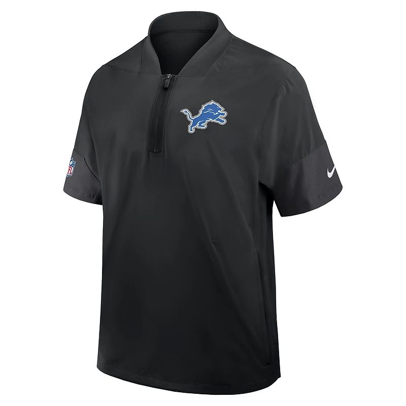 Veste d'entraîneur Nike Detroit Lions Sideline noire pour homme, manches courtes, fermeture éclair au quart, technologie Dri-FIT