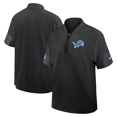 Veste d'entraîneur Nike Detroit Lions Sideline noire pour homme, manches courtes, fermeture éclair au quart, technologie Dri-FIT
