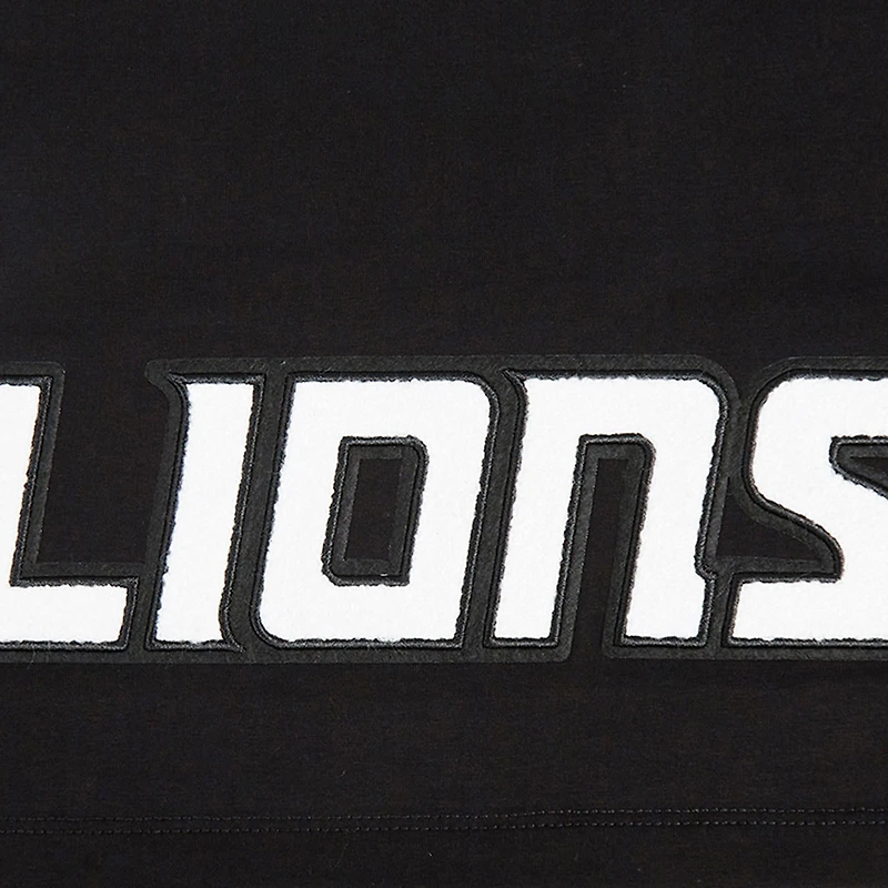 T-shirt court et boxy noir Pro Standard Amon-Ra St. Brown pour femme avec nom numéro de joueur des Lions Detroit