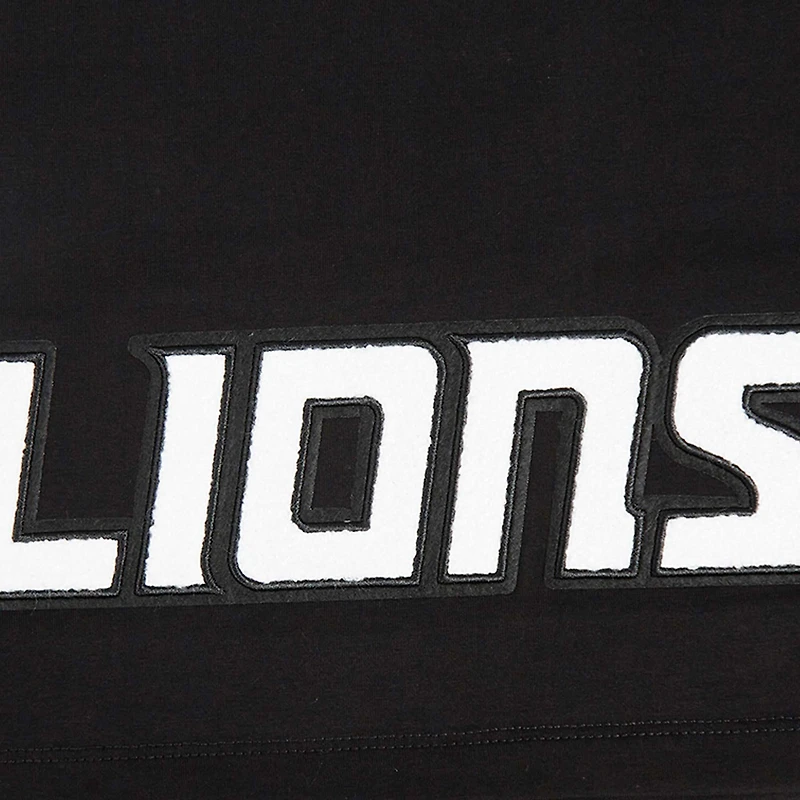 T-shirt court et boxy noir Pro Standard Amon-Ra St. Brown pour femme avec nom numéro de joueur des Lions Detroit