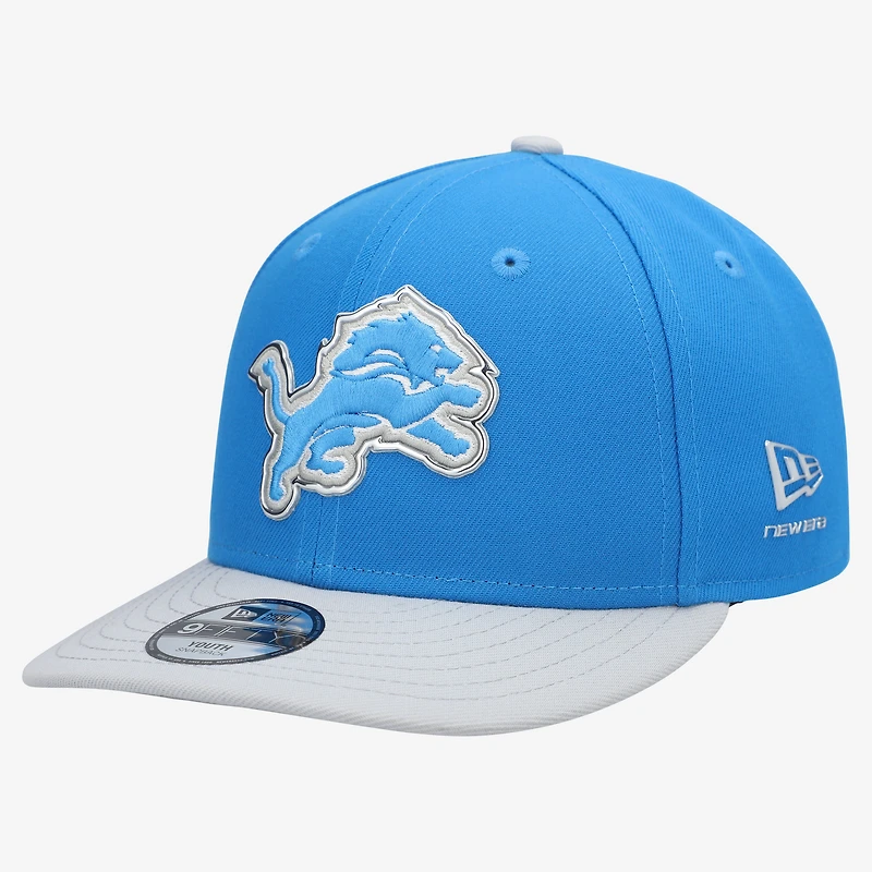 Casquette snapback New Era bleue/argentée Detroit Lions 2026 NFL Draft pré-courbée pour jeunes