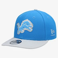 Casquette snapback New Era bleue/argentée Detroit Lions 2026 NFL Draft pré-courbée pour jeunes